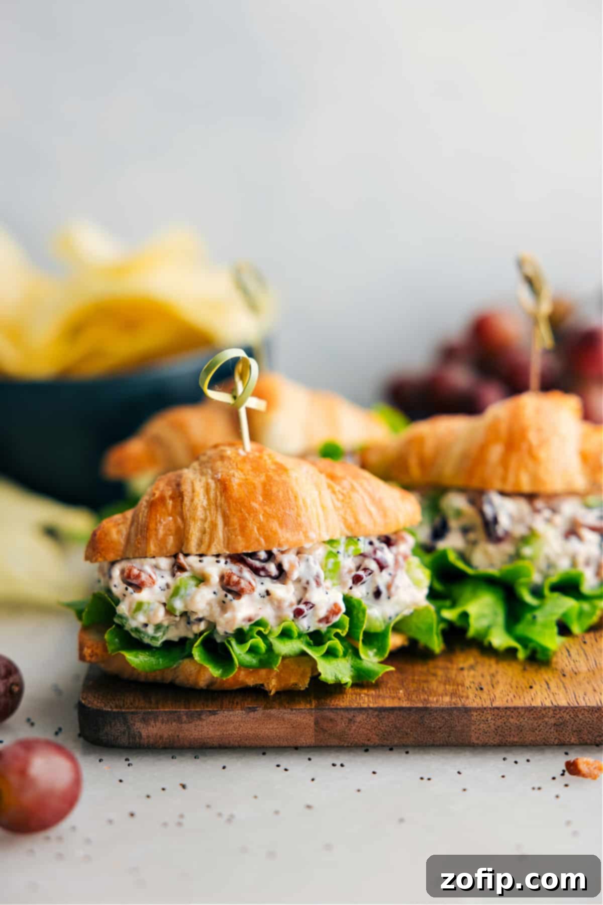 Chicken Salad recipe assembled in a croissant with fresh lettuce, ready to be enjoyed.