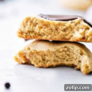 A freshly baked peanut butter cookie, golden brown and perfectly soft, displayed as a recipe image.
