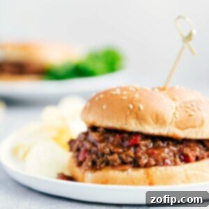 A delicious Crockpot Sloppy Joe on a brioche bun with the filling overflowing.