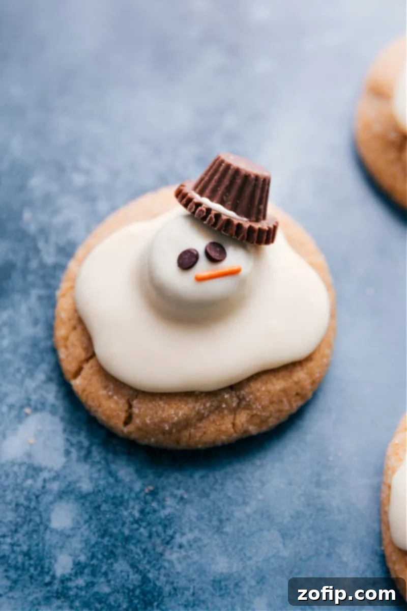 Overhead image of beautifully decorated Melted Snowman Cookies ready to be enjoyed, showcasing their unique melted appearance.