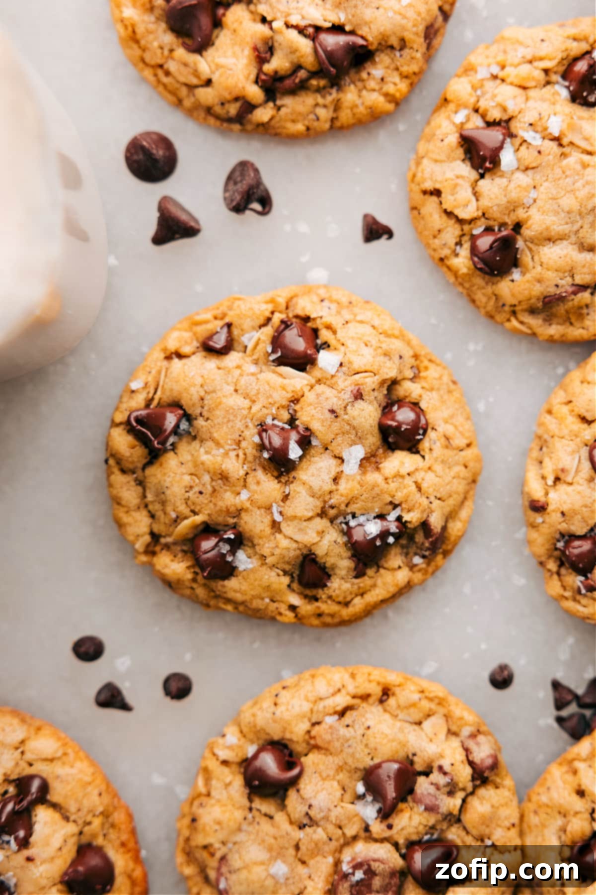 Enjoy these Brown Butter Oatmeal Chocolate Chip Cookies fresh out of the oven, sprinkled with flaky sea salt.
