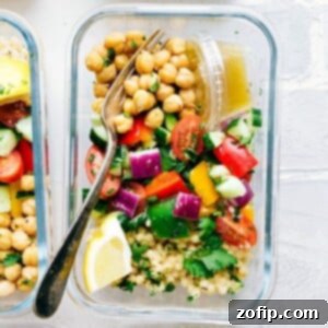 Greek Couscous Meal Prep Salad 3 Greek couscous salad in a glass container for lunch.