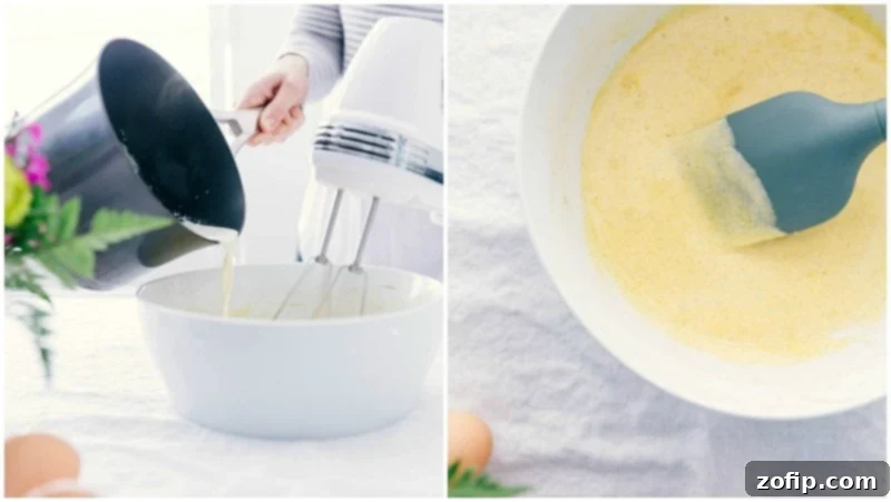 The process of tempering eggs with warm cream, ensuring a smooth custard base for Crème Brûlée, with a whisk actively blending the mixture.