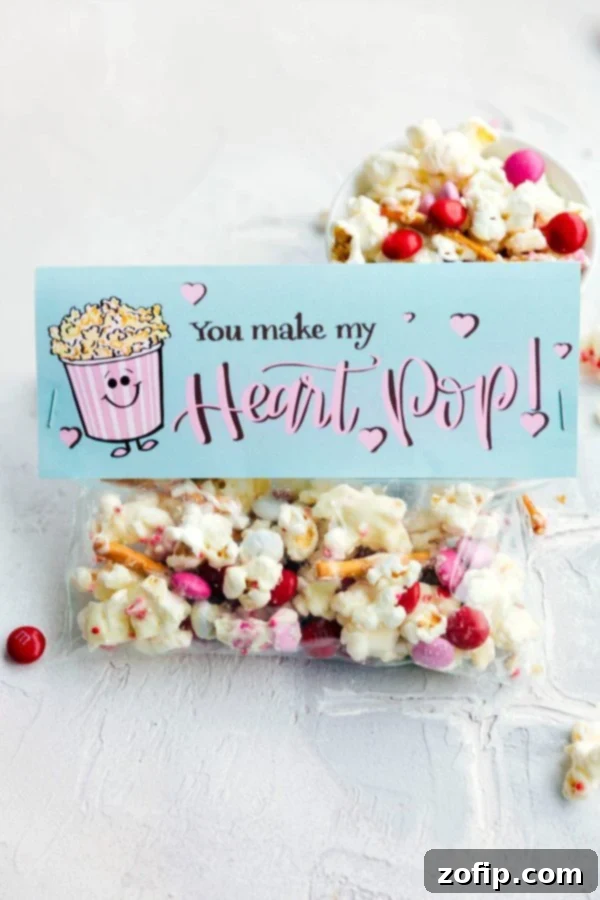 Delicious 'You Make My Heart Pop' white chocolate popcorn mix for Valentine's Day