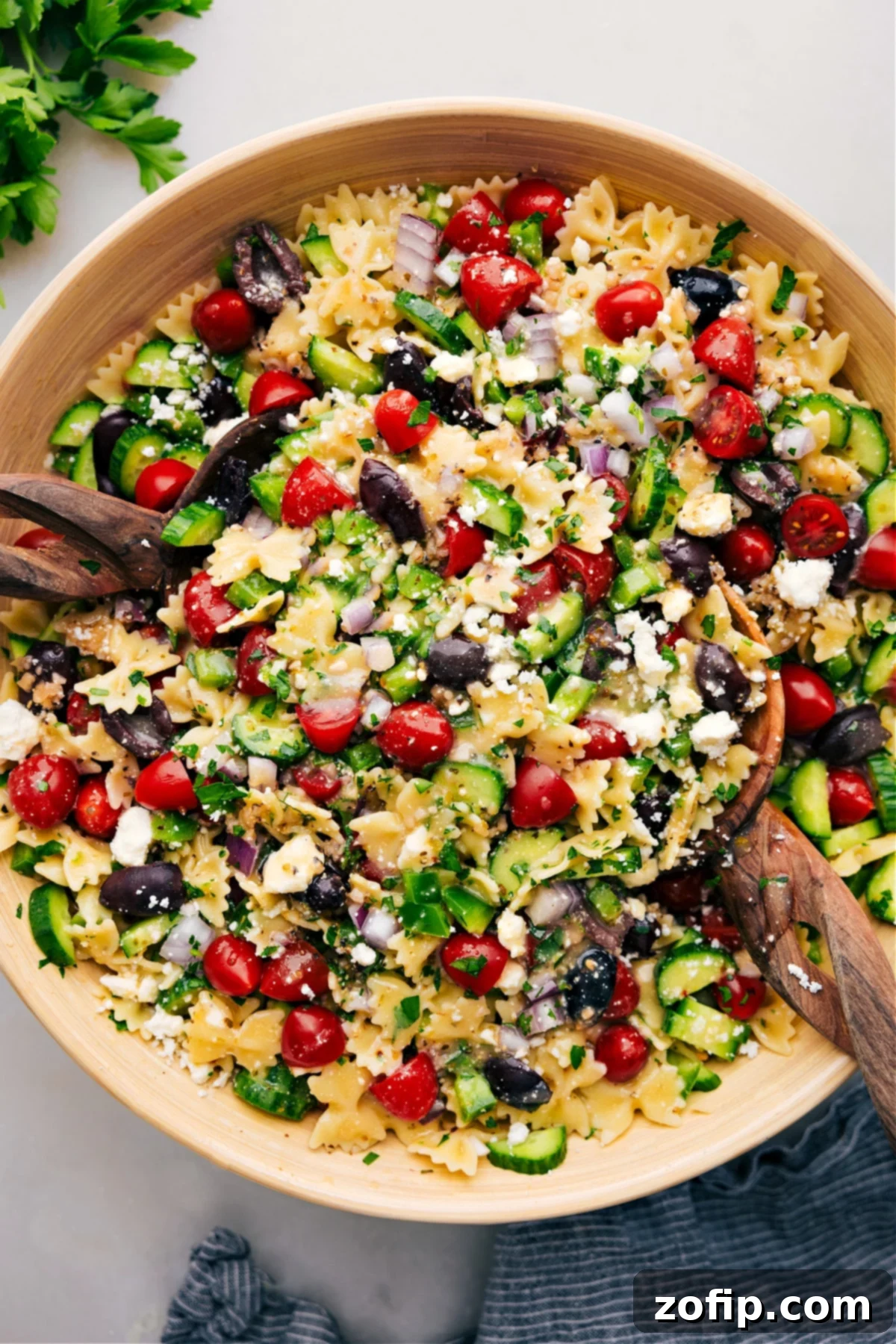 Easy Greek Pasta Salad in a bowl ready to be served, showcasing vibrant colors.