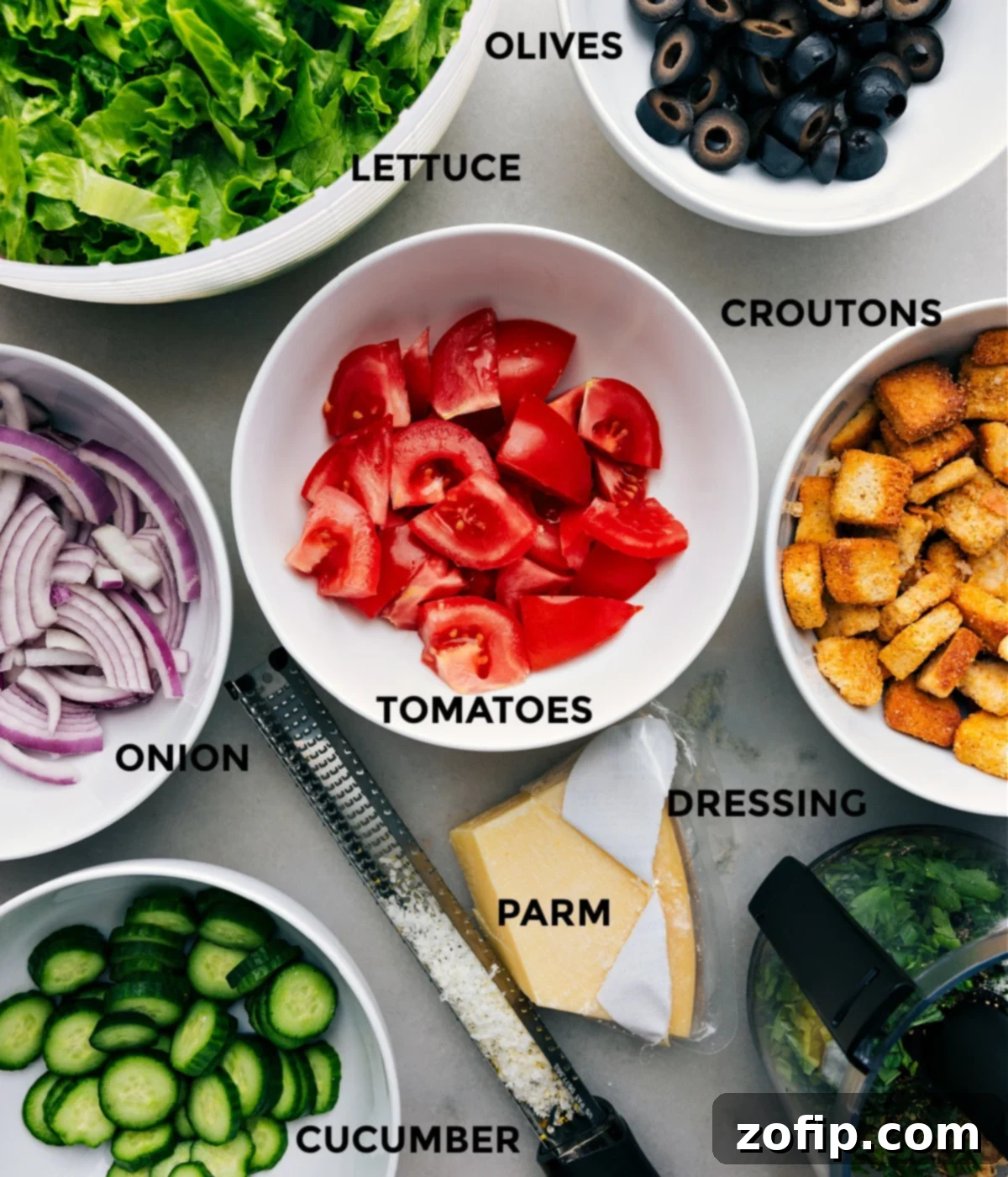 Vibrant Italian Garden Salad 2 All the fresh ingredients for the homemade Italian Salad meticulously prepped and laid out for easy assembly in a clean kitchen setting.