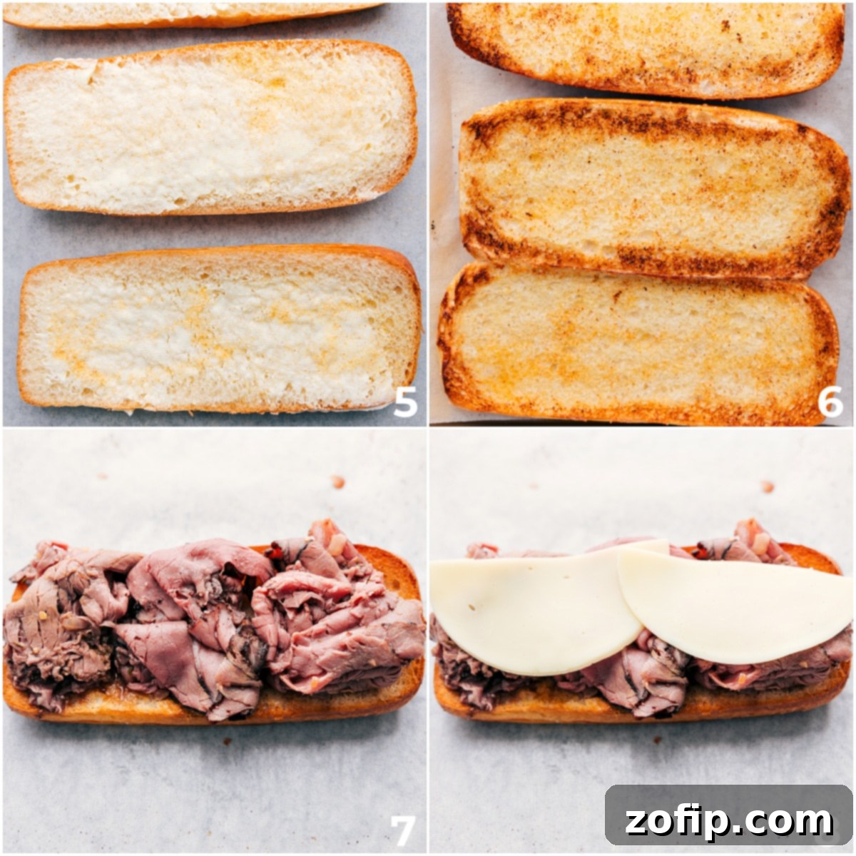 The buns being toasted to a golden crisp and the roast beef and melty cheese being layered inside, ready for the top bun.