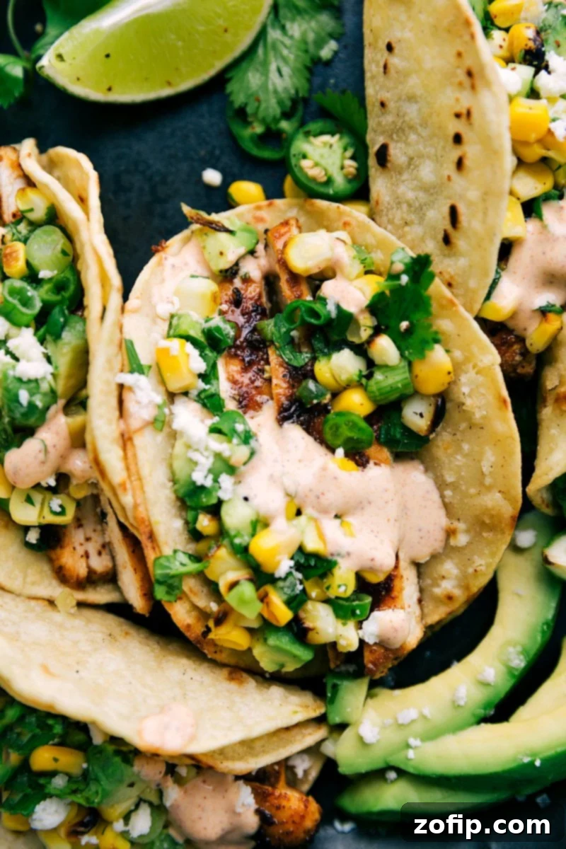 Elote Chicken Tacos 2 Delicious grilled chicken tacos with vibrant corn and avocado salsa