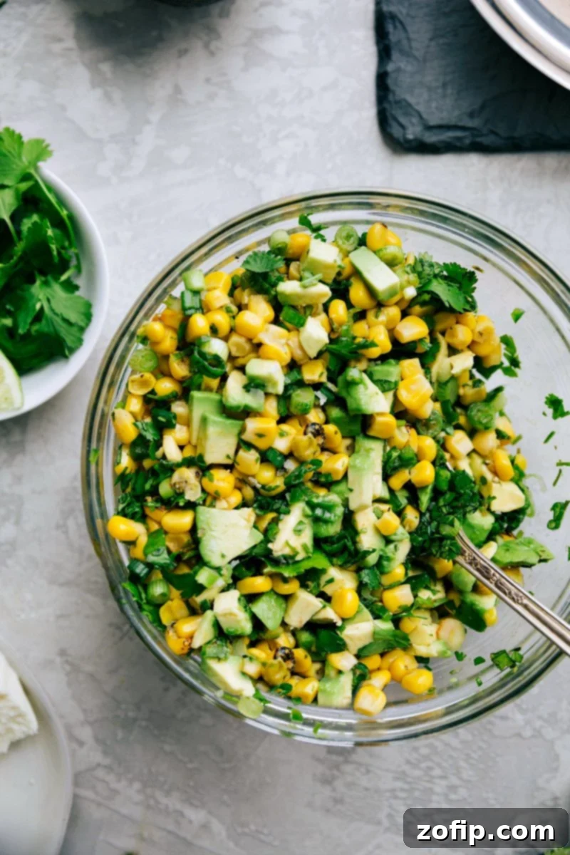 Whipping up the fillings for these delicious chicken tacos Preparing the fresh and colorful fillings for delicious chicken tacos