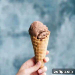 Perfect Homemade Gelato 3 A waffle cone cone filled with rich and creamy chocolate gelato.