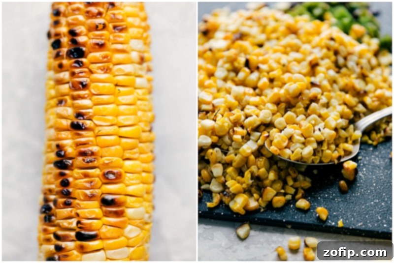 Grilled corn on the cob with the kernels being skillfully removed, preparing them for the creamy corn salad recipe, highlighting the smoky texture.