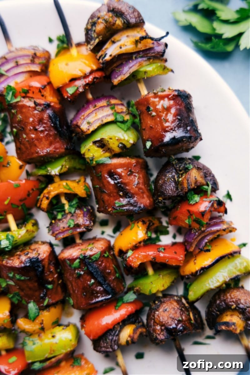 Beautifully plated Grilled Sausage Kabobs with colorful vegetables