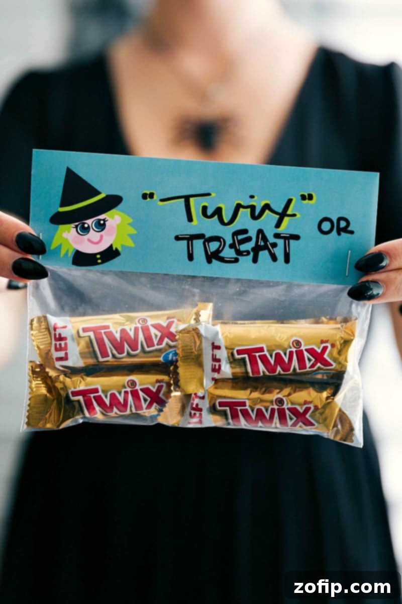 A vibrant collection of 6 DIY Halloween treat bags, each featuring a unique themed printable topper and filled with various candies and snacks like Twix, homemade Goblin Goodies, Reese's Pieces, Hershey's Kisses, Lifesavers, and candy eyeballs.