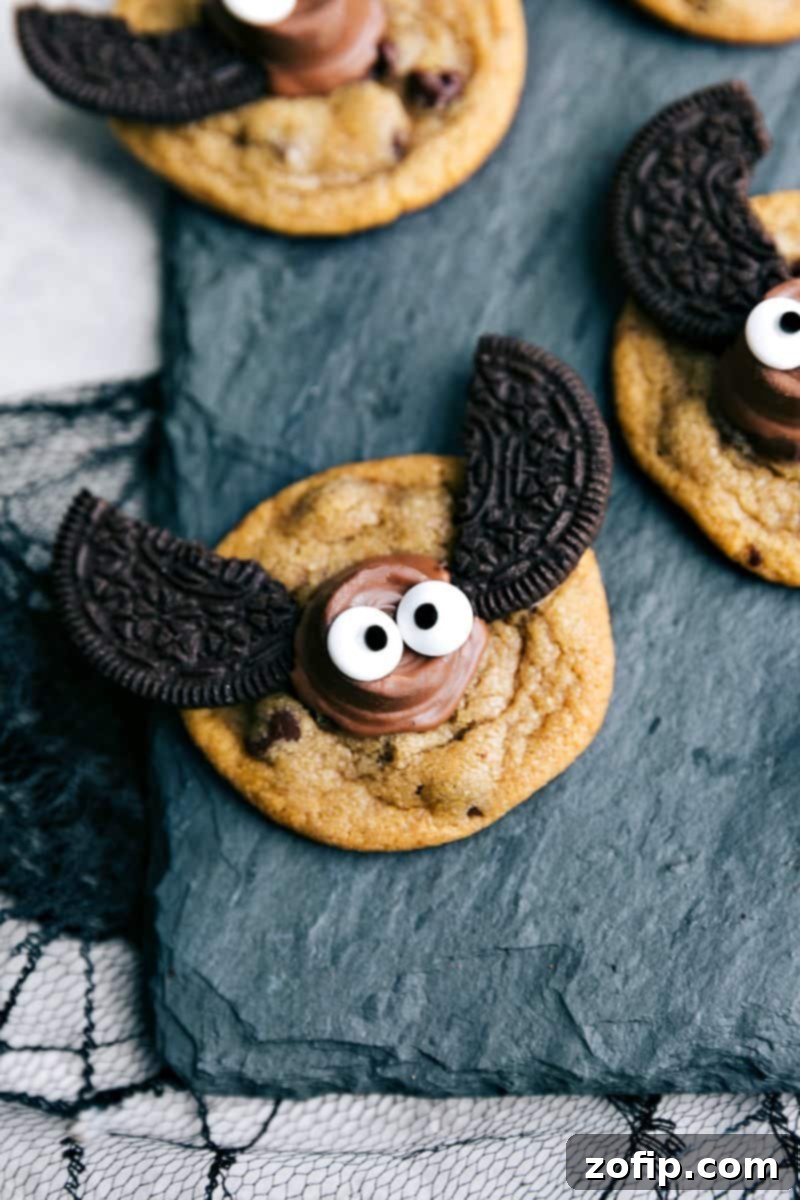 Halloween cookies decorated to look like bats, with Rolo bodies and Oreo wing halves.
