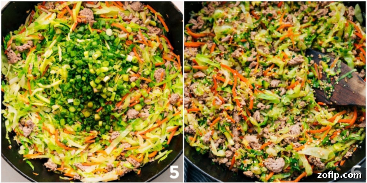 A large skillet filled with perfectly cooked Ground Turkey Stir Fry, garnished with fresh green onions and sesame seeds, ready to be served.