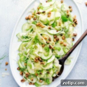 Refreshing Apple Fennel Crunch 4 Close-up of the Apple Fennel Salad, showcasing the crisp texture of the thinly sliced ingredients and toppings
