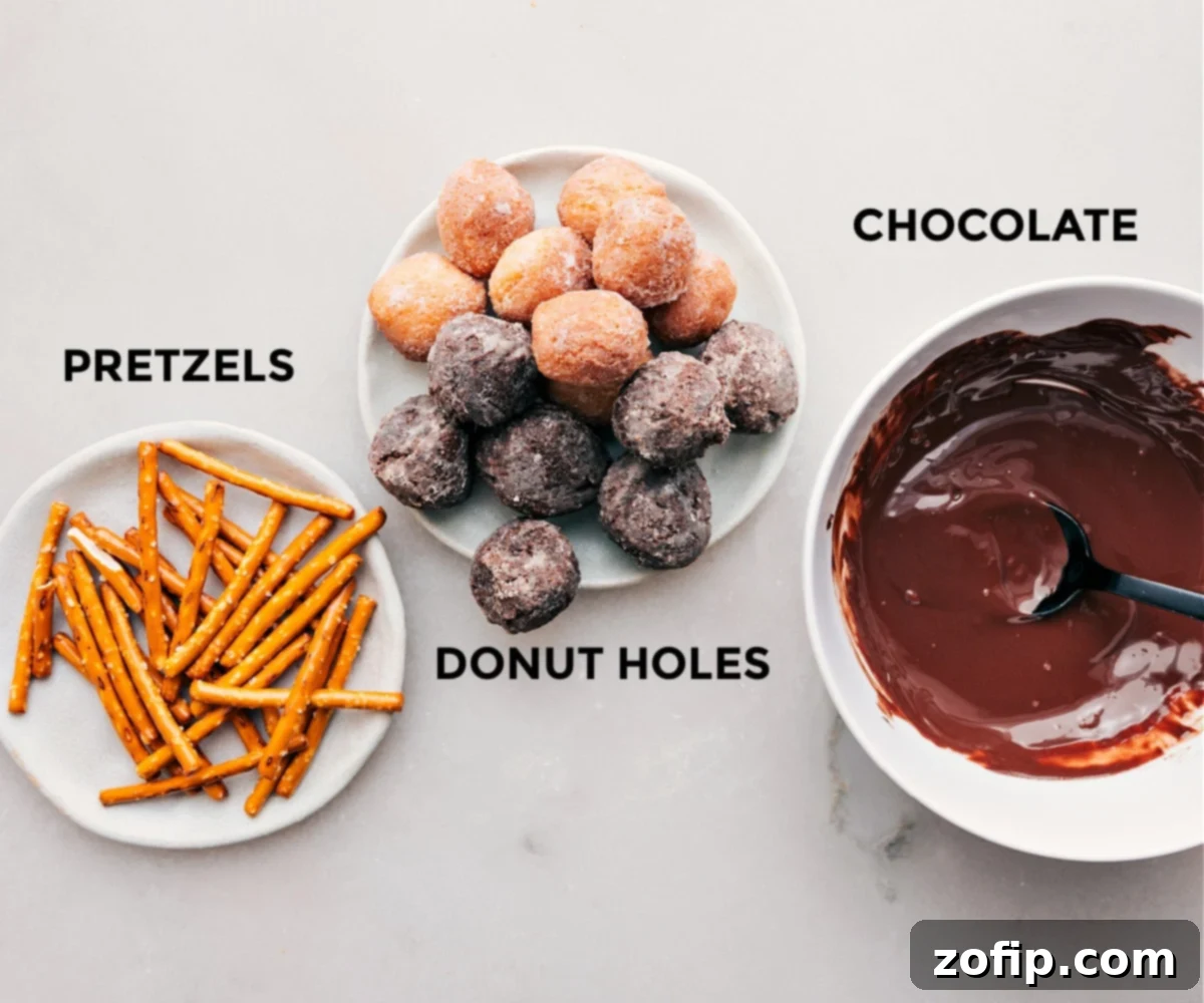 A close-up shot of several Acorn Donut Holes arranged artfully on a serving platter, showcasing various toppings.