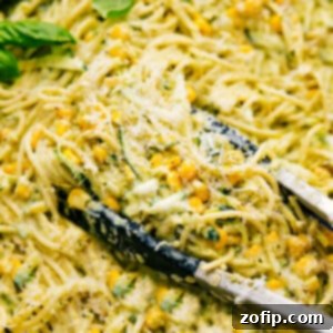 The Zucchini Pasta Sauce mixed in with the noodles and all tossed together for a creamy and delicious dinner!