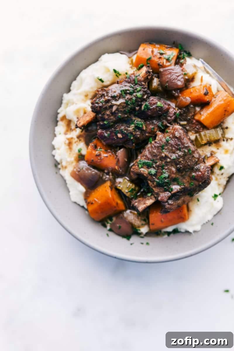 Melt-in-Your-Mouth Short Ribs 2 Perfectly cooked Short Ribs Recipe with a rich gravy and tender vegetables