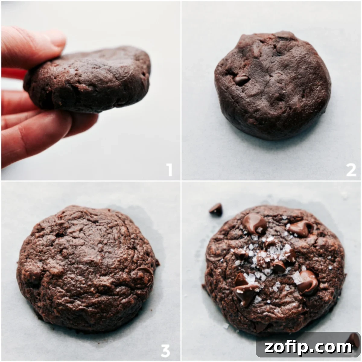 Brownie cookie dough balls flattened into discs and baking on a sheet pan, transforming into delicious cookies.