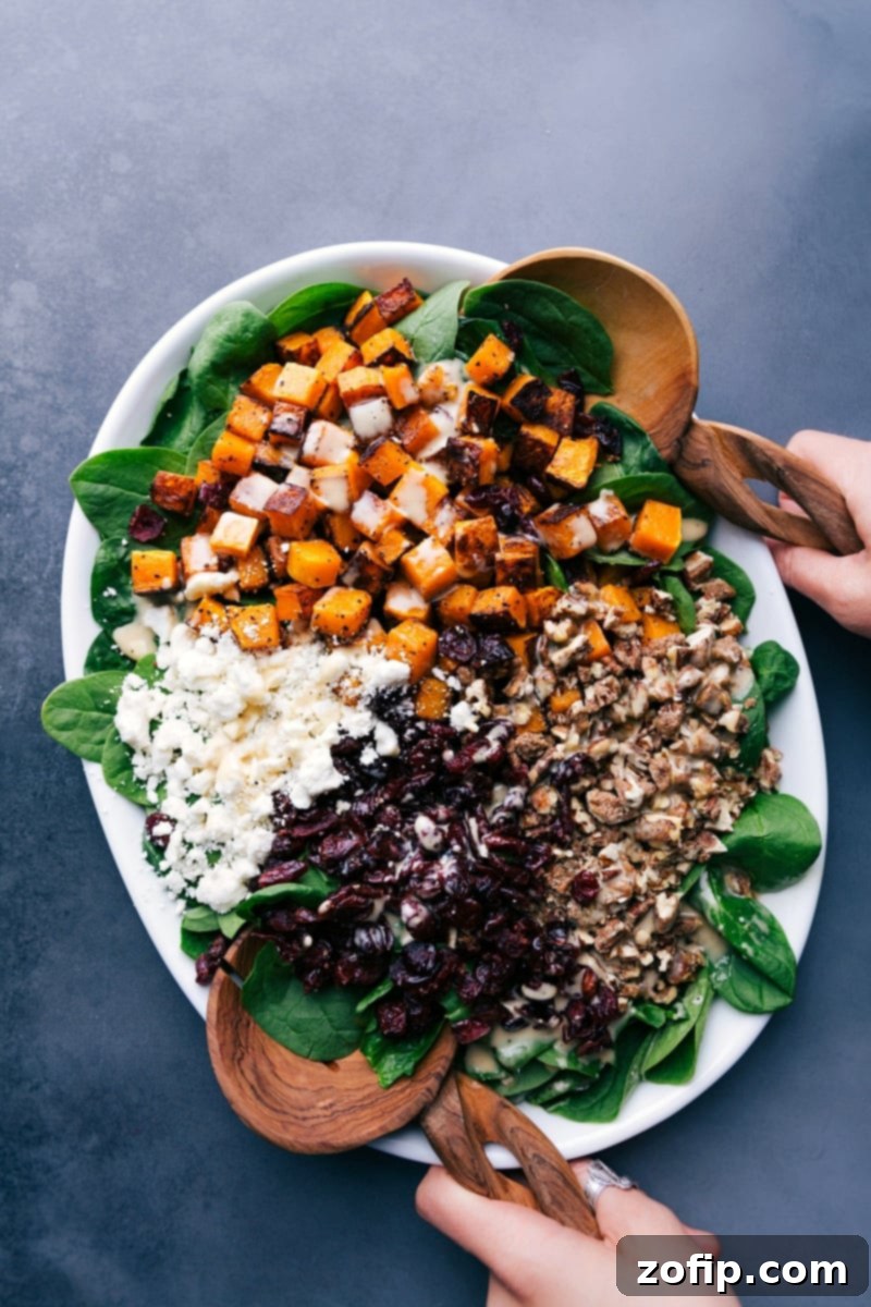 Butternut squash salad, freshly dressed, showing its vibrant colors and textures.