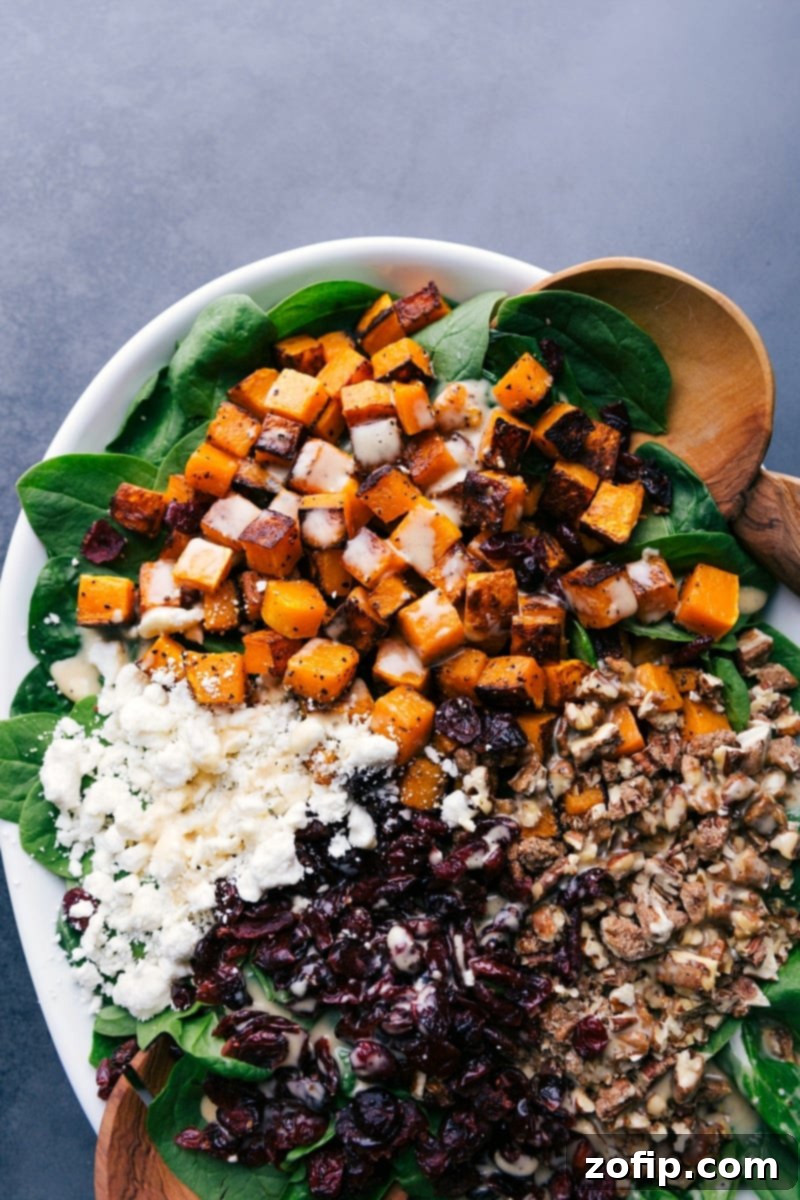 Butternut Squash Salad, fully dressed and ready to be served, showcasing its appealing presentation.