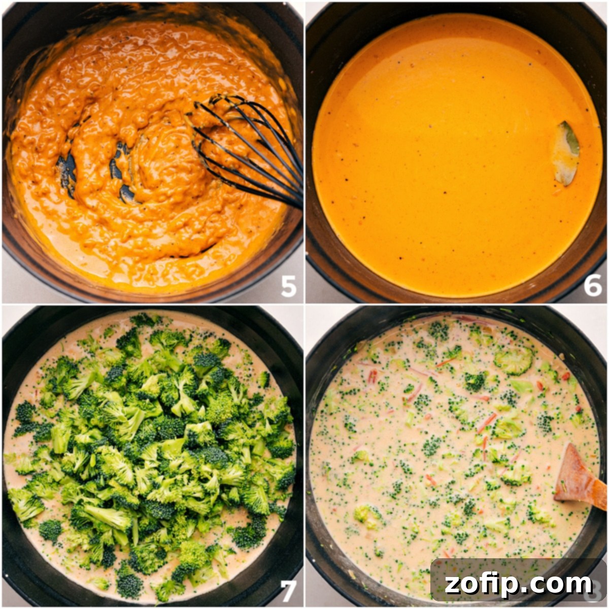 Close-up of creamy, rich broccoli cheddar soup simmering in a pot, with tender broccoli florets visible.