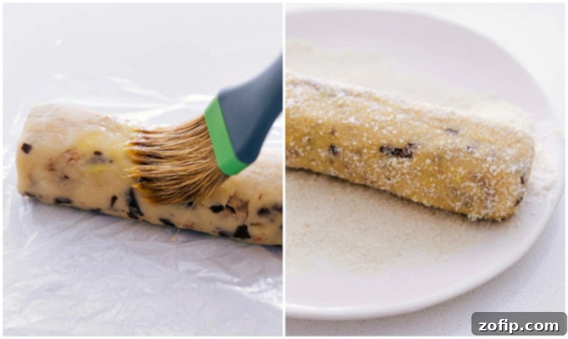 Sugar-coated Toffee Shortbread cookie dough Coating the Toffee Shortbread cookie dough cylinders in cane sugar for a crisp edge.