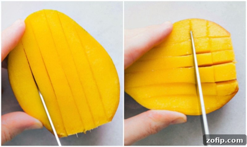 Slicing the remaining narrow sides of the mango from around the pit for smaller fruit pieces.