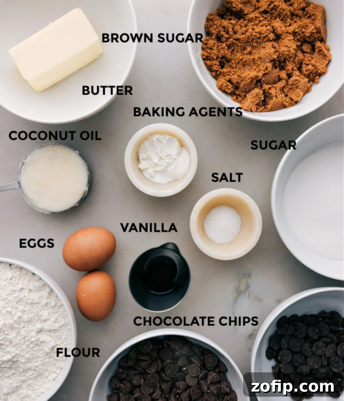 Close-up of freshly scooped coconut oil chocolate chip cookie dough balls, ready for baking.