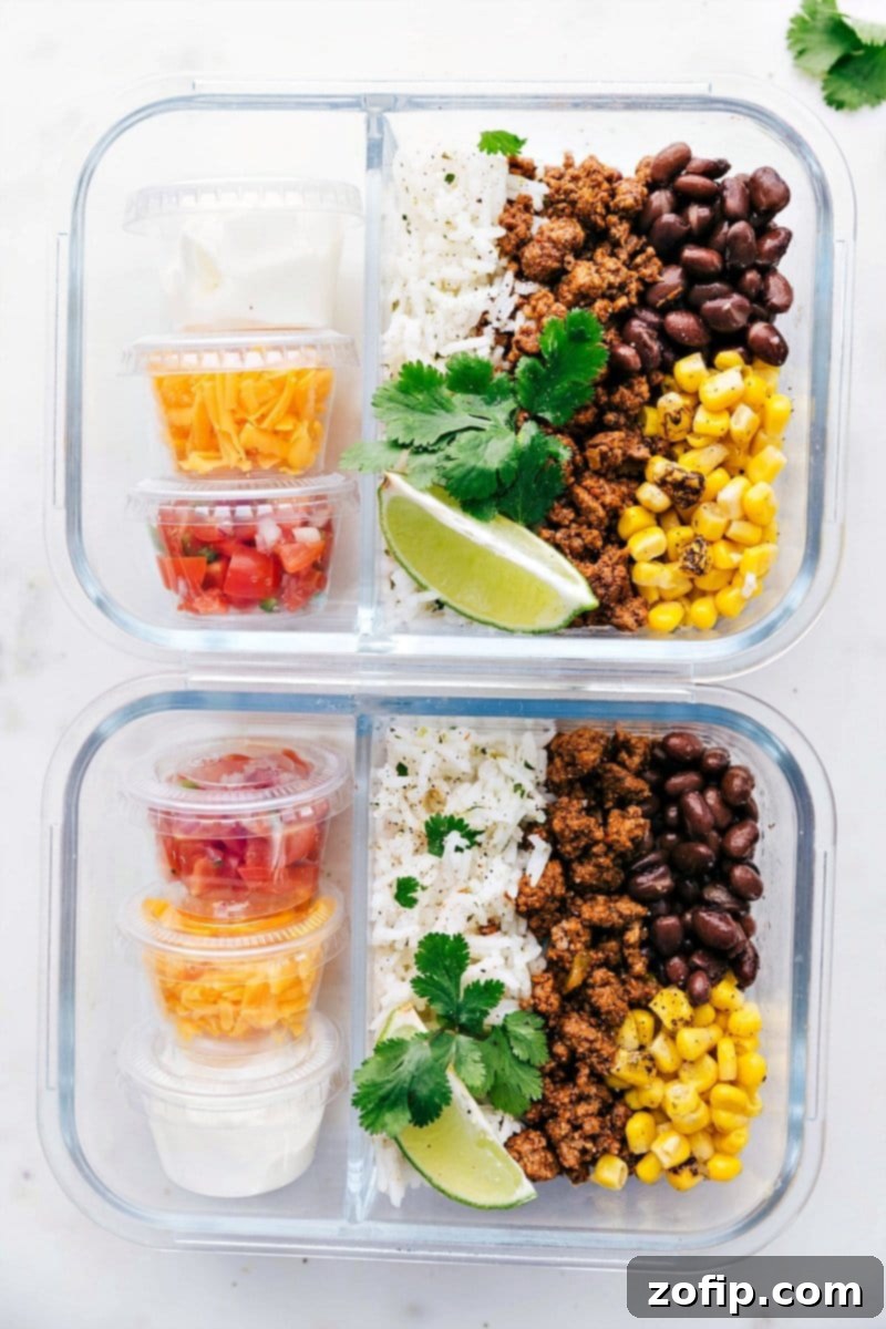 An easy to make Taco Bowl recipe! This meal is filling, packed with good ingredients, and is a great make-ahead weekly meal prep option. Delicious Taco Bowl ready for meal prep containers, showcasing fresh ingredients and vibrant colors.