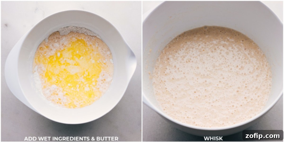 Blending Dry and Wet Ingredients for Pancake Batter A close-up view of pancake batter being gently mixed in a bowl, showing a slightly lumpy but smooth consistency, indicating perfect preparation.