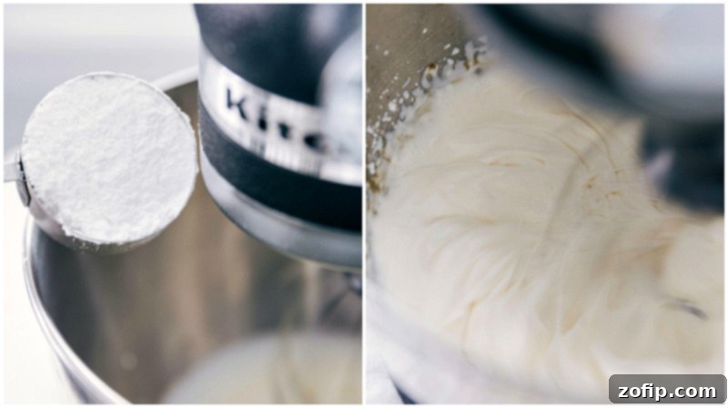 Learn how to make the BEST homemade whipped cream with simple ingredients and techniques! Powdered sugar being added to heavy whipping cream in a mixer bowl, illustrating the ingredient addition step.
