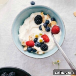 Easy Homemade Whipped Cream 2 A vibrant close-up of light and fluffy homemade whipped cream, ready to be served.