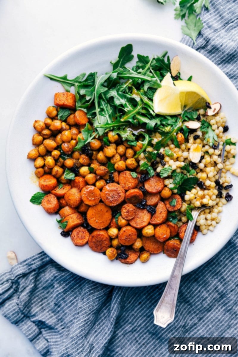 Moroccan Carrot Salad with roasted carrots, chickpeas, and garlicky couscous