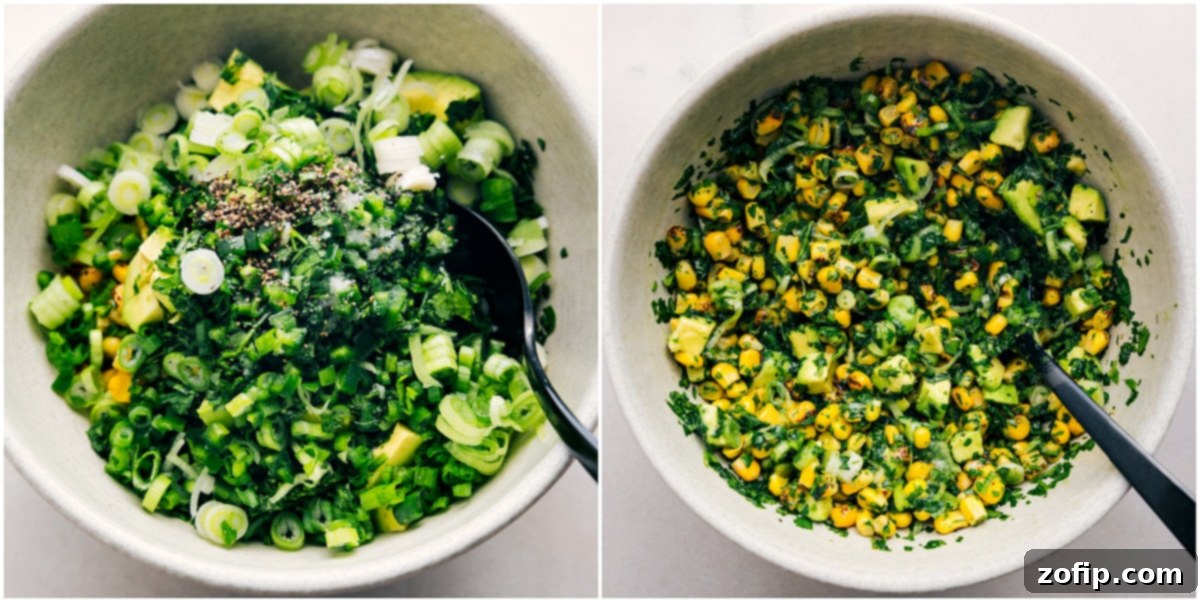 The vibrant Mexican street corn topping mixed together in a large bowl, showcasing fresh corn, herbs, and jalapeño, ready to be piled onto baked sweet potatoes.