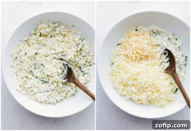 A close-up of baked stuffed shells in a baking dish, glistening with marinara sauce and melted cheese.