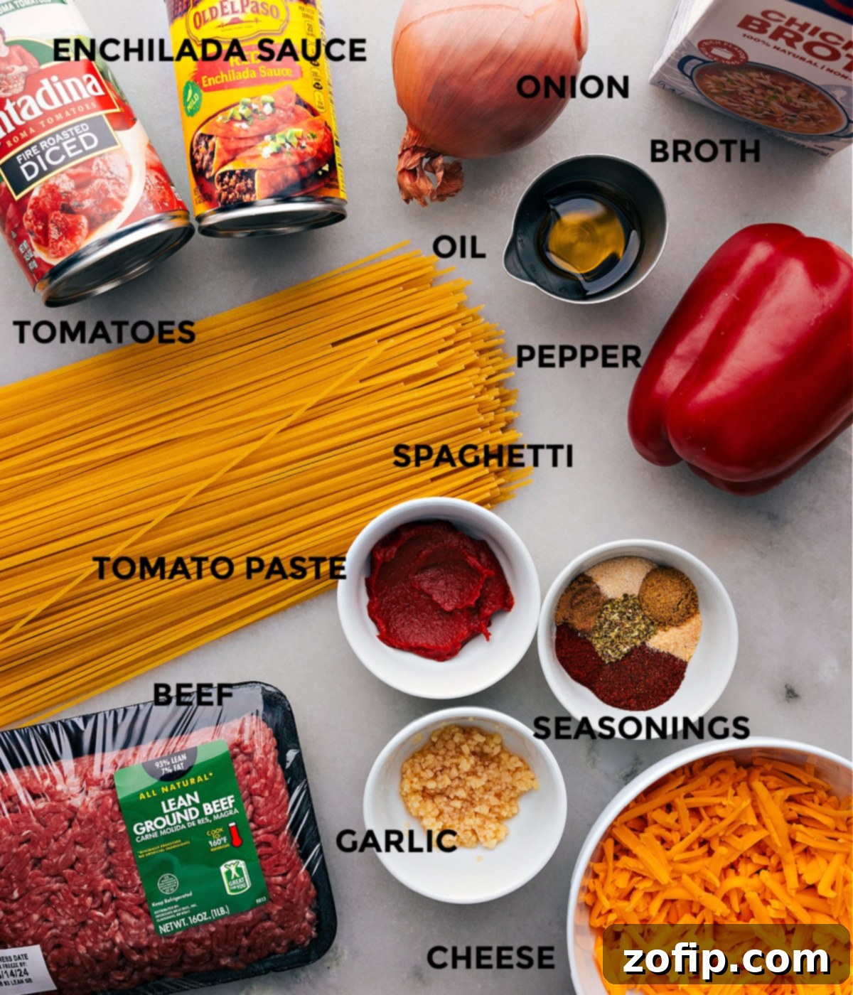 All fresh ingredients for the Taco Spaghetti recipe laid out neatly on a counter, ready for cooking.