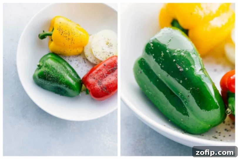 Colorful bell peppers being seasoned with spices on a cutting board, ready for cooking.