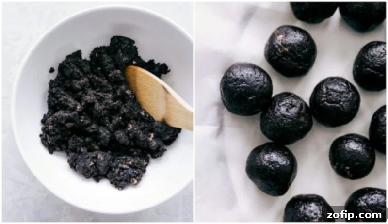 Oreo truffle dough being rolled into uniform balls, demonstrating the shaping process before chilling and dipping.
