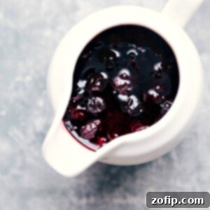 Luscious Blueberry Syrup 3 Delicious Homemade Blueberry Syrup in a jar with fresh blueberries