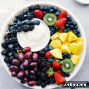 A delicious fruit dip served on a platter with a variety of fresh fruit.