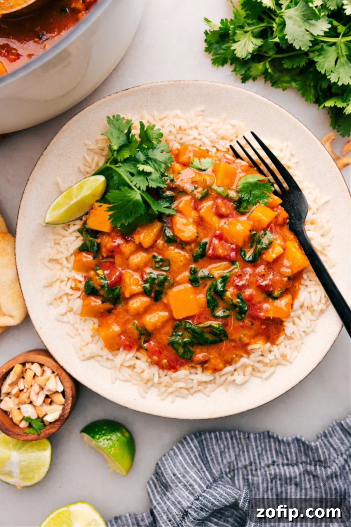 The Best Butternut Squash Curry Recipe Serve butternut squash curry on a bed of rice, and top it with cilantro and lime.
