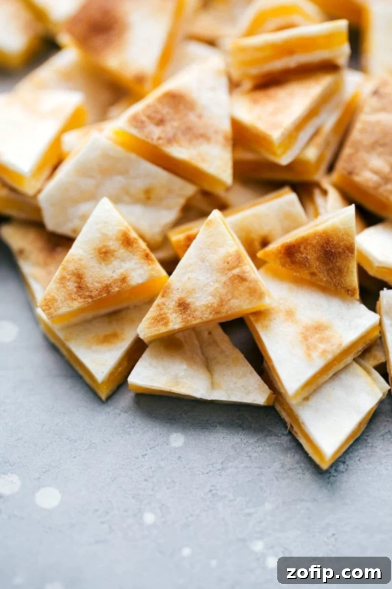 Image of various mini-cut quesadilla pieces arranged, highlighting their readiness for the chicken quesadilla soup.