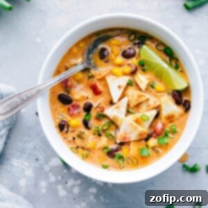 A delicious and creamy slow cooker chicken quesadilla soup with quesadilla croutons.