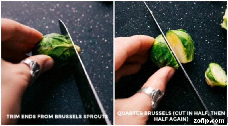 Brussels sprouts being carefully halved and trimmed, preparing them for cooking.