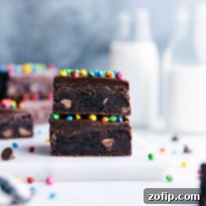 Fudgy homemade Cosmic Brownies with colorful candy sprinkles.