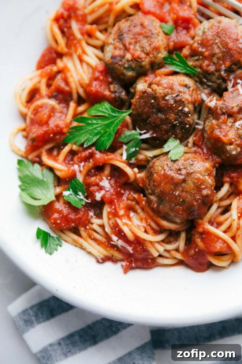 The meat mixed with al dente pasta and rich red sauce, served in a bowl and ready to be enjoyed.