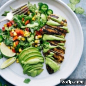 Grilled Peruvian chicken served with green sauce and salad.