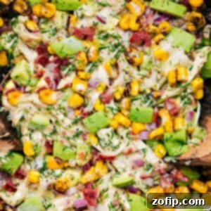 A close-up of Avocado Chicken Salad, showcasing its vibrant ingredients and creamy texture.
